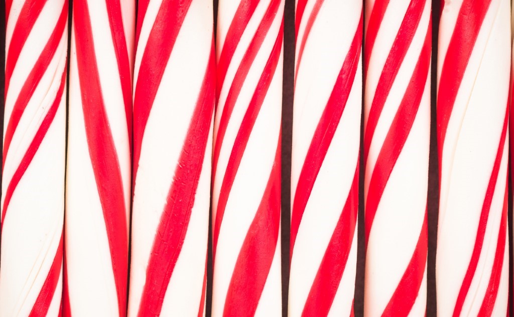 A picture containing red, row, outdoor, flag

Description automatically generated